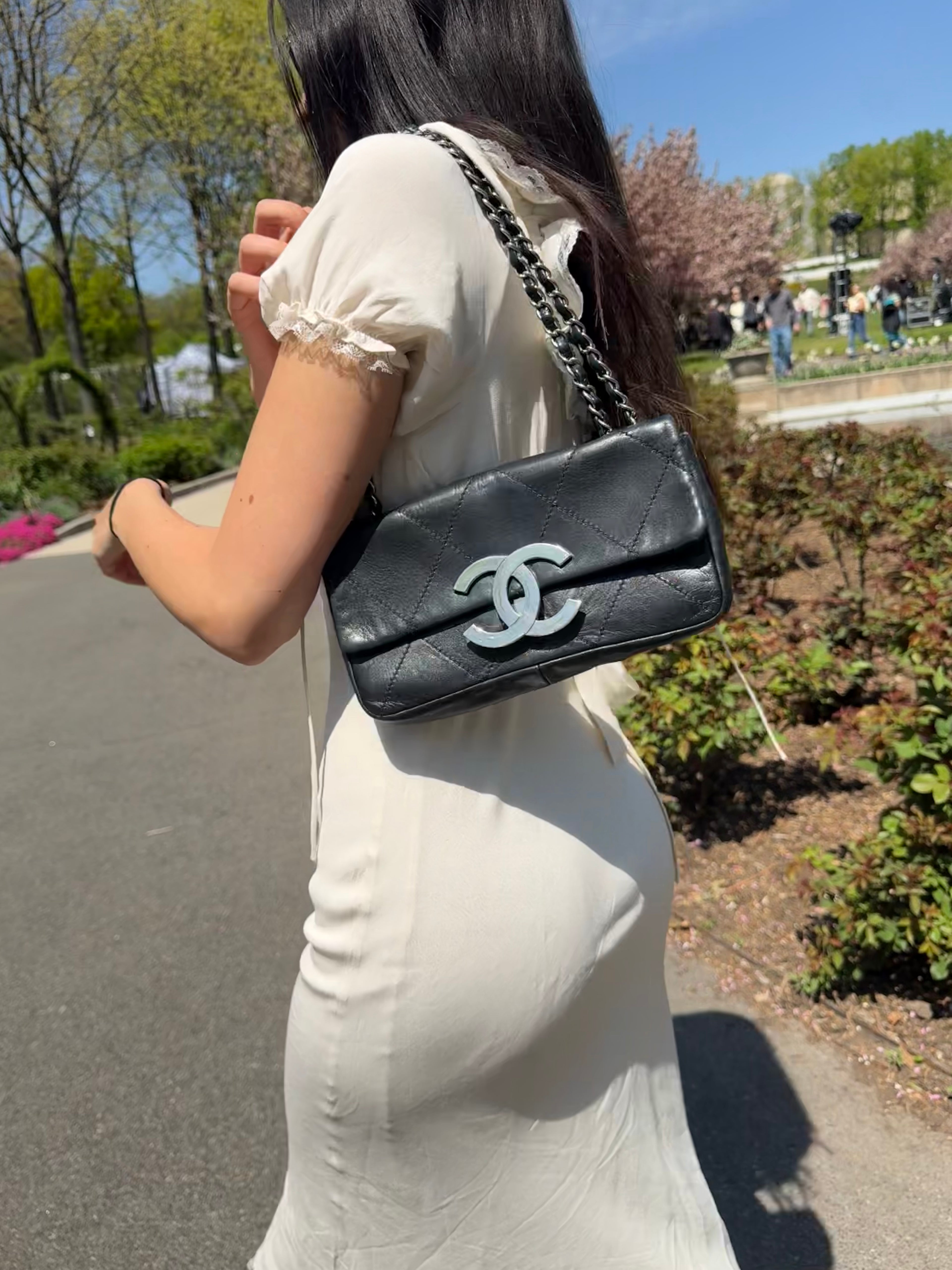 Chanel CC Quilted Flap Bag  Black Calfskin, Silver Hardware